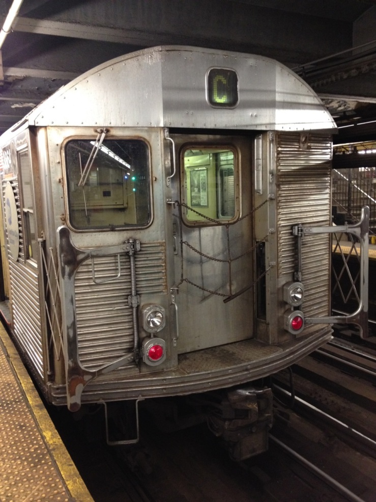 The C train sitting in the 168th Street station.